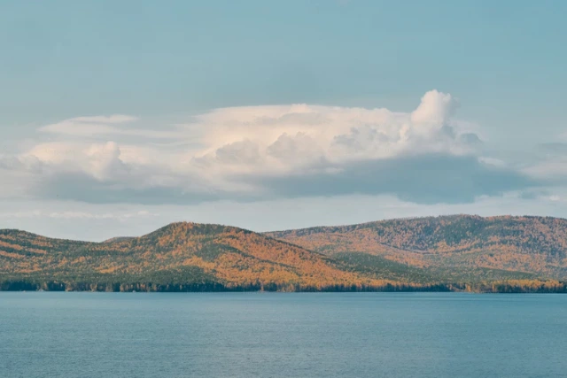 Kolsai and Kaindy Lakes surrounded by forested mountains, Kazakhstan
